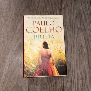 Paulo Coelho Brida Hard Cover Paperback Novel - Cream & Red Cover